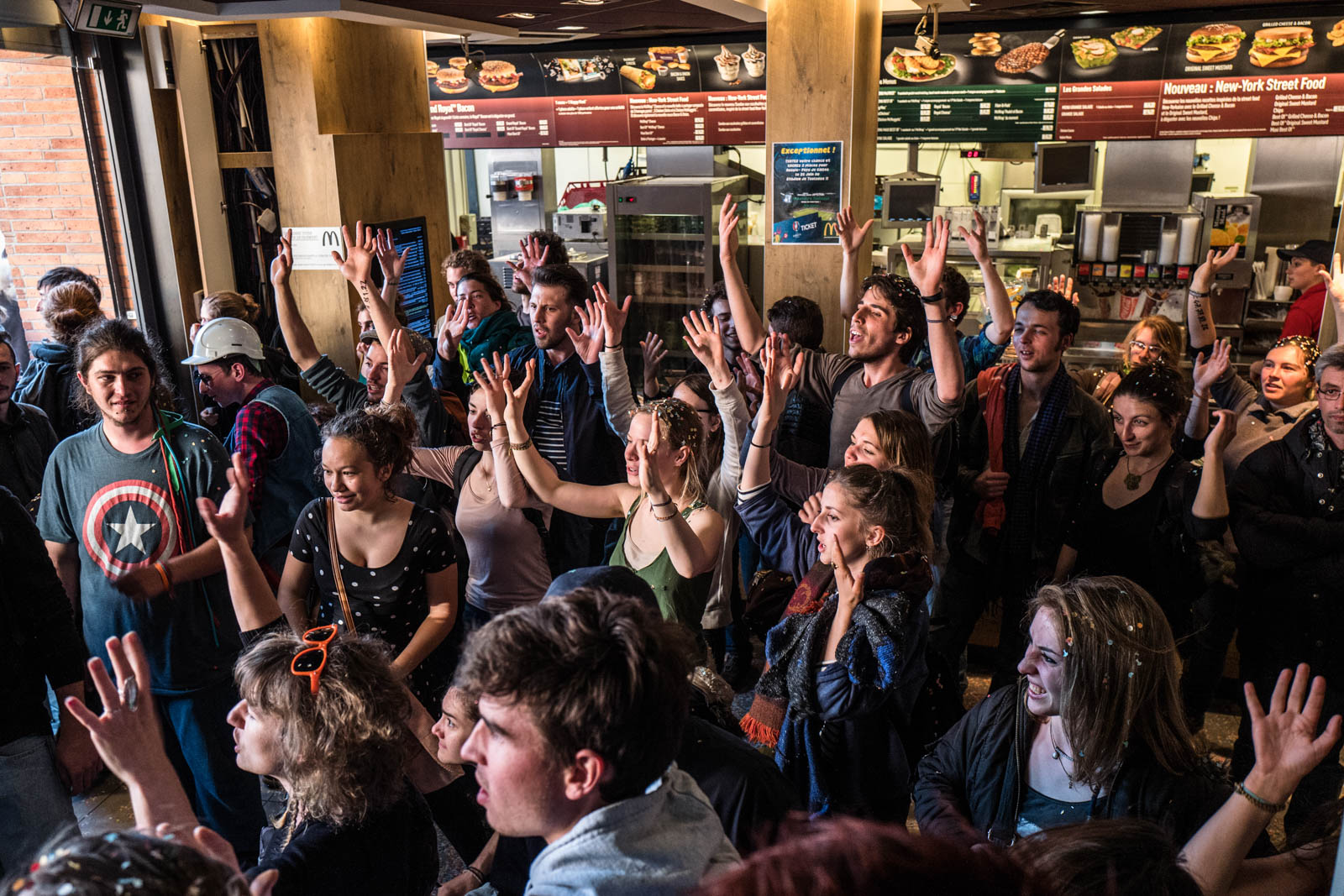 Between 150 and 200 people from the Night Stand movement and association Right to Housing (DAL ) invested the McDonald's of the Capitol Square. The police evacuated protestors  from the fast food on the Capitol Square.  03, may 2016, Toulouse-FRANCE .
Entre 150 et 200 personnes du mouvement Nuit Debout et de l'association Droit Au Logement(DAL) ont investi le McDonald’s de la place du Capitole. La police a ensuite procédé à l'évacuation  des manifestants du fast food sur la place du Capitole. 3/05/2016, Toulouse-FRANCE.