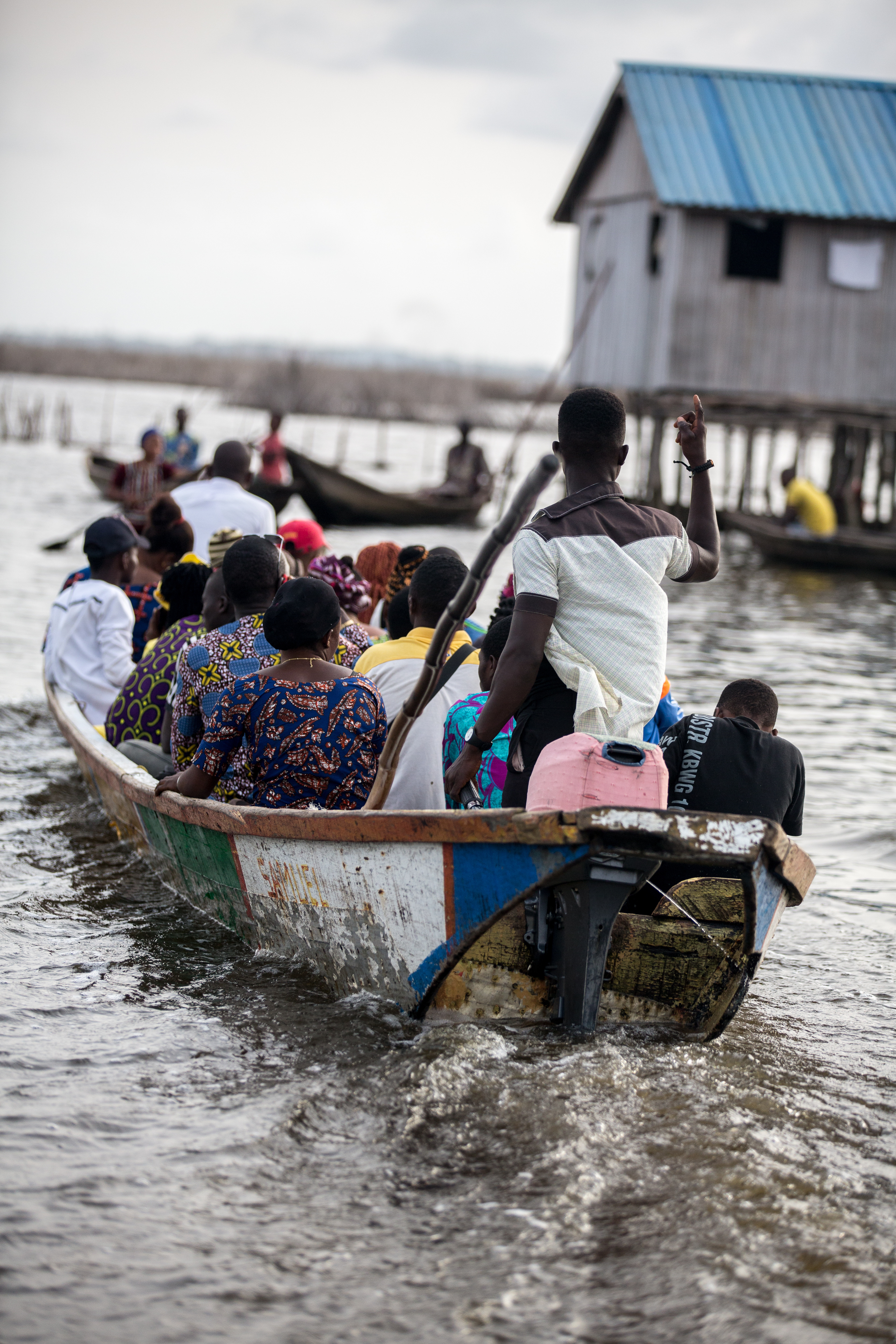 Ganvié.
A man on his canoe on Lake Nokoué.
Ganvié is a lakeside city in southern Benin that is part of the municipality of Sô-Ava in the Atlantic department, located on Lake Nokoué north of the metropolis of Cotonou, it is listed since 1996 on the indicative list of UNESCO but it is not yet classified.
Ganvié is one of the six projects included in the 2016-2021 Government Action Program (GAP) to develop tourism.
The cost of the project is estimated at 20 billion CFA francs (about 30.5 million euros).It includes sanitation and cleaning of the lake (from mid-2018 to the end of 2019. Ganvié 1, Benin - March 28, 2018.
Vie sur l’eau à Ganvié. 
Un homme sur sa pirogue sur le lac Nokoué.
Ganvié est une cité lacustre du sud du Bénin qui fait partie de la commune de Sô-Ava dans le département de l'Atlantique, situé sur le lac Nokoué au nord de la métropole de Cotonou, elle est inscrite depuis 1996 sur la liste indicative de l'UNESCO mais elle n’est pas encore classée.
Ganvié fait partie des six projets retenus dans le Programme d’actions du gouvernement (PAG) 2016-2021 pour développer le tourisme.
Le coût du projet est estimé à 20 milliards de F CFA (près de 30,5 millions d’euros). Il comprend l’assainissement et le curage du lac (de la mi-2018 à la fin de 2019. Ganvié 1, Bénin- 28 mars 2018., 2018.